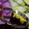 8 Strand Silver Crossover Bracelet