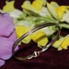 4 Strand Silver Accented Bracelet